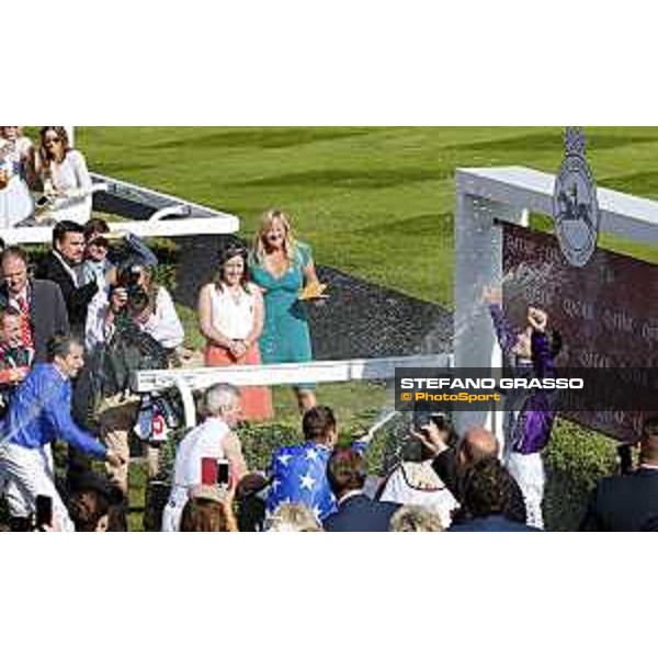 Richard Hughes is sprayed with champagne by his fellow jockeys on his last day of this riding career. Goodwood, QATAR Goodwood Festival, 1st august 2015 ph.Stefano Grasso/QEF