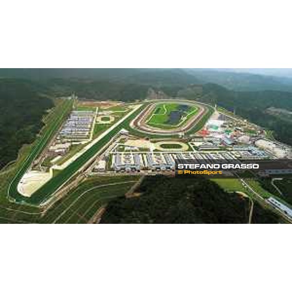 an aerial view of Conghua racecourse and training center. Source HKJC